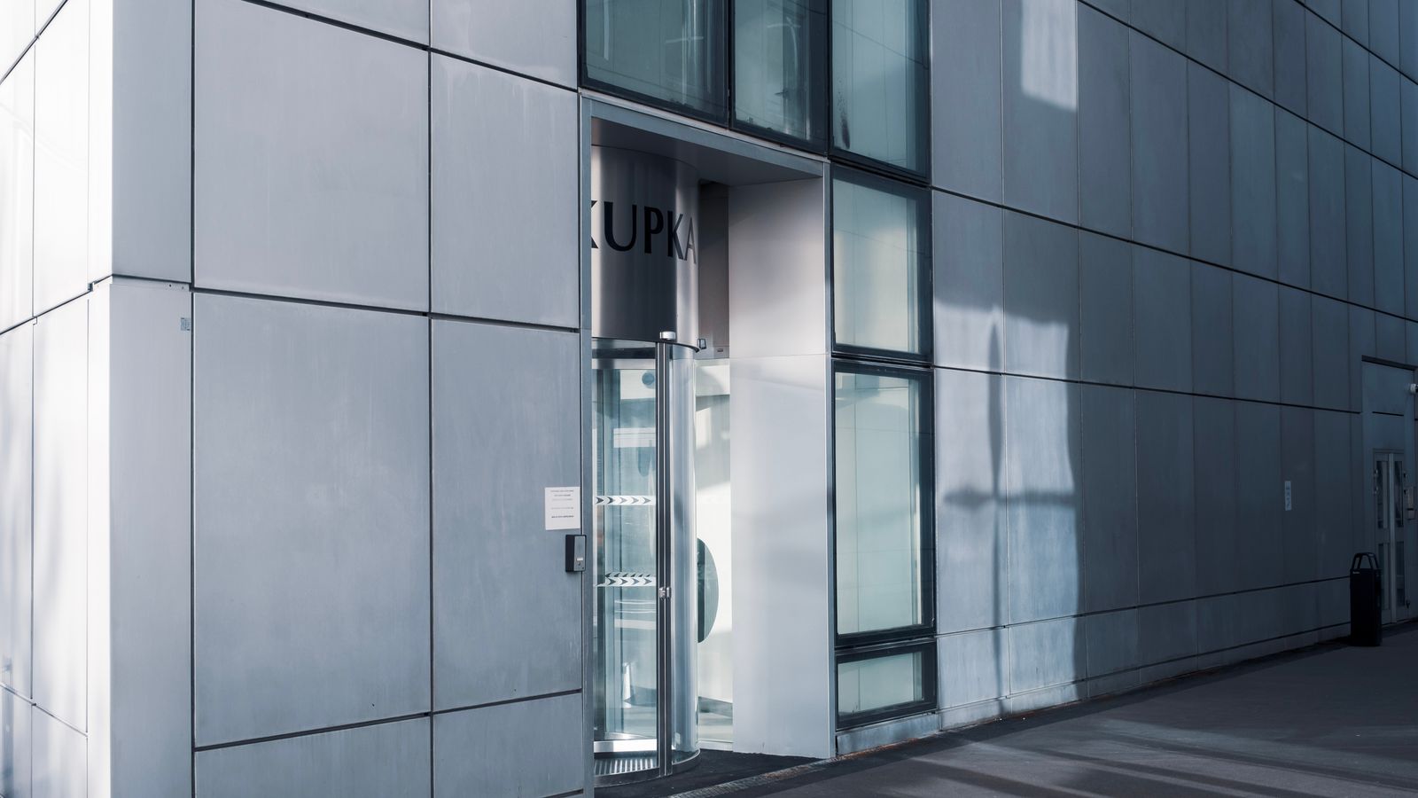 Commercial automatic entrance doors on a modern facade